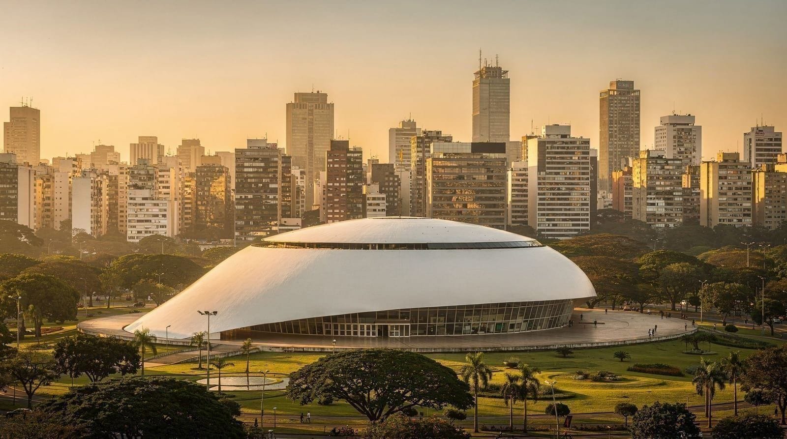 Avenida Paulista at dusk with the São Paulo skyline behind it
